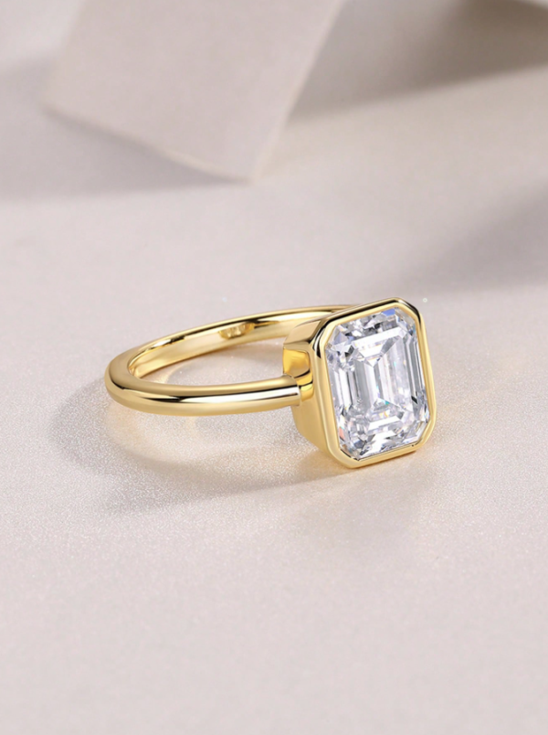 Simple, Elegant 2ct Emerald Cut Moissanite Ring - Image 2
